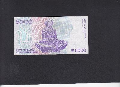 Beschrijving achterzijde: STATUE